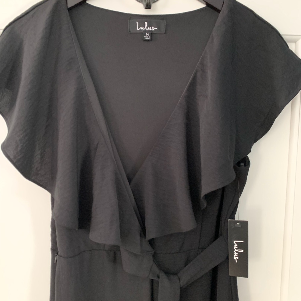 NWT Lulu’s black jumpsuit.